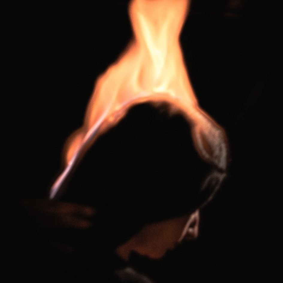 woman with fire on the head for energy cleansing